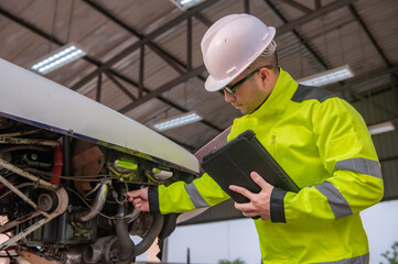 Technician fixing the engine of the airplane,Female aerospace engineering checking aircraft engines,Asian mechanic maintenance inspects plane engine