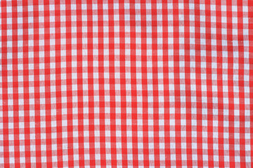 Picnic table cloth. Seamless checkered pattern. Vintage red plaid fabric texture. 