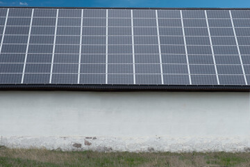 white building with solar panels