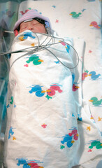 Newborn baby sleeping in his first audi test