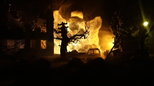 Nuclear war concept. Explosion of nuclear bomb. Apocalyptic view of city downtown after bombing. Night scene. City destroyed by war.