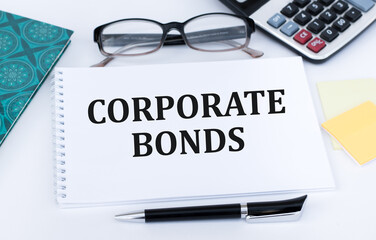 white notebook with words government bonds on the office table. Trading concept.
