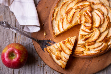 Apple pie, delicious pastry dessert with slices of apple on top