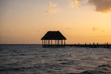 Beautiful sunset over a pier in Holbox, Mexico. Holbox sunset. 