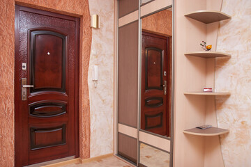 cozy entrance hall in the apartment in a light color