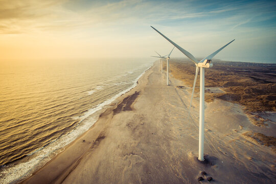 wind turbine on the beach at sunset in Denmark 