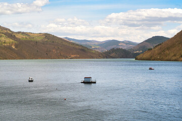 Fototapeta na wymiar Beautiful artificial mountain lake Zlatar in Serbia ideal for fishing, swimming and recreation