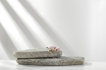 White wall with shadows and stone background. Free space for your decoration 