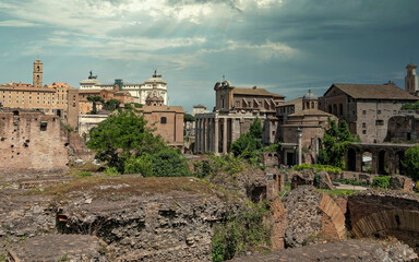 Fototapeta premium Rome Italy, panoramic view of the roman forum under impressive sky