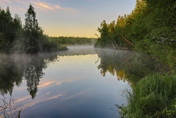 Dawn Lake Landscape. Fog over the water. Views of Russia