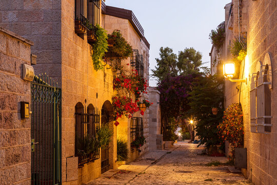 The old Jerusalem neighborhood of Mishkenot Shaananim or Yamin Moshe in the evening light. Israel