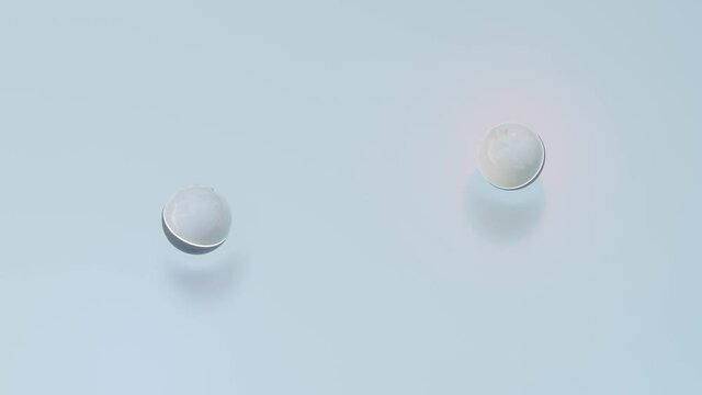 a black-white glossy ball with a luminous strip rolls on a gray background. looped animation. 3d render
