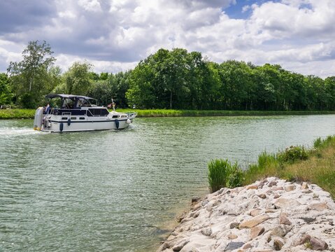 Bramsche, Lower Saxony, Germany - May 27, 2019: View of a boat on the Midland Canal (Mittellandkanal)