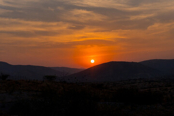 Panoramic view of a mountainous landscape at sunset