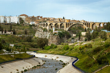 CONSTANTINE, ALGERIA - View of stone bridges and old houses on the cliff at Constantine, Algeria. Panorama of Constantine city, Algeria	