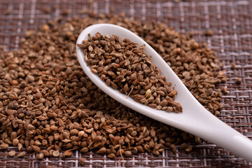 A scattering of anise seeds. Anise seeds close up.