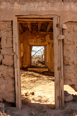 Fototapeta na wymiar Abandon Old Adobe structures and homes found along Highway 28 in Southern New Mexico