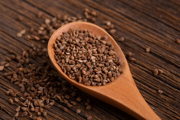 A scattering of anise seeds. Anise seeds close up.