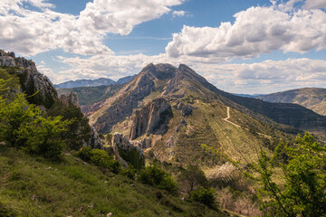 Mountain in the interior of the province of Alicante (Spain), called Mallada del Llop, on an afternoon with sun and clouds.