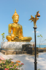 Gold giant buddha statue, a monument commemorating victims of tsunami at Ban Nam Khem Tsunami Memorial Center Park in Takua Pa, Thailand.