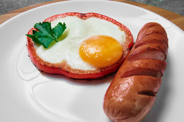 fried egg with red bell pepper on the plate