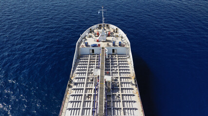 Aerial drone photo of crude oil tanker carrier anchored in deep blue open ocean sea