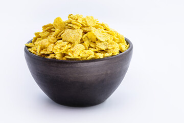 brazilian corn flour in handmade clay pot, isolated white background