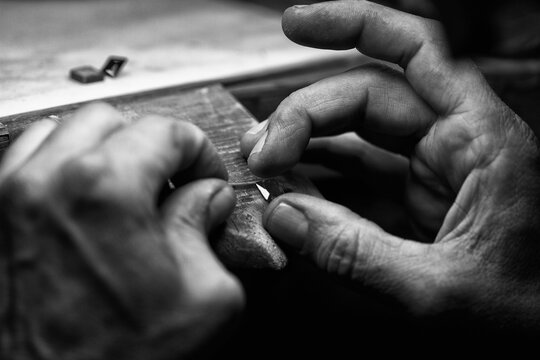 Goldsmith's hands at work, handmade jewelery