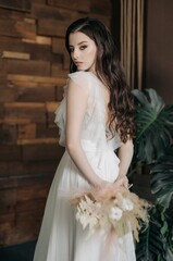Naklejka premium Beautiful girl in a light dress. Boho style.