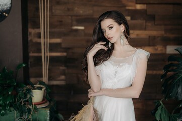 Naklejka premium Beautiful girl in a light dress. Boho style.
