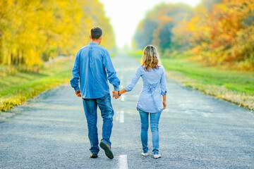  couple in love on road are walking