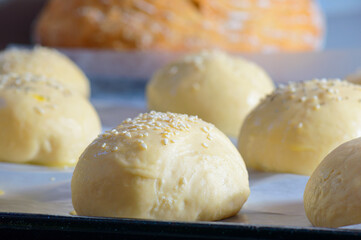 Home baking artisan brioche burger buns. Cooking bread.