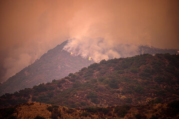 Fire and smoke in the mountains of California. Forest fires. Air Pollution. Toxic smoke. Fires in the United States. Climate change. - 431785033