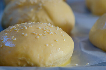 Home baking artisan brioche burger buns. Cooking bread.