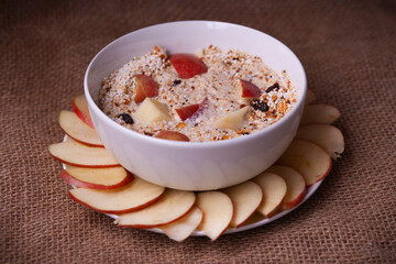 Rich amaranth cereal with apple and raisins