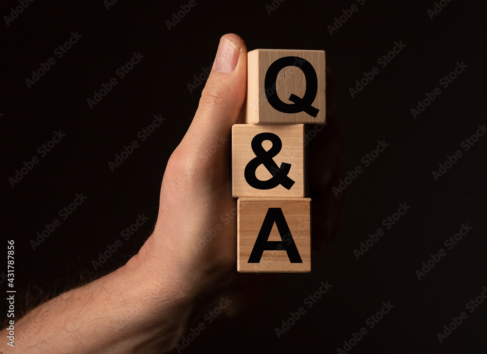 Poster qa or q concept. qna acronym on wooden cubes on black background with copy space.