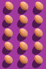 Organized pile of eggs on a purple background. Eggs background with shadow, 3D rendering, top view
