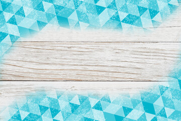 Teal triangles swirl on weathered whitewash wood background