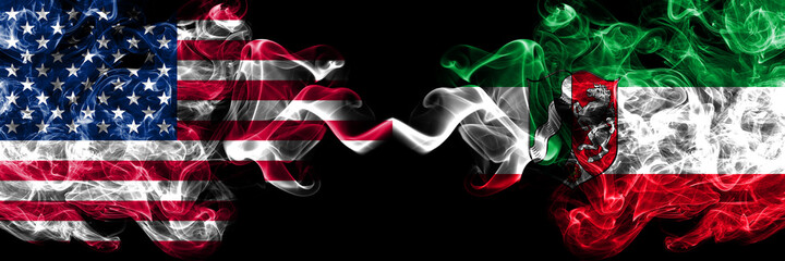 United States of America, America, US, USA, American vs Germany, North Rhine Westphalia, state smoky mystic flags placed side by side. Thick colored silky abstract smoke flags.