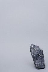 Gray stones on a gray background. Monochrome background.