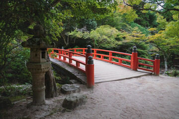 Typical japanese bridge in autumn park on Mount Misen in Miyajima, Hiroshima, Japan