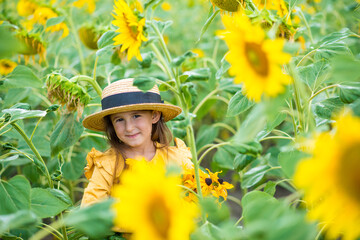 A little girl is in the field