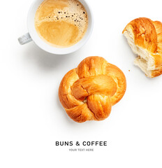 Coffee cup and fresh buns creative layout.