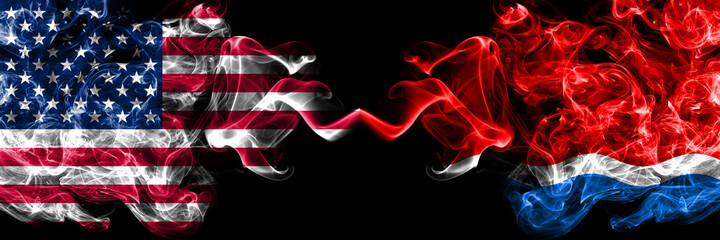 United States of America, America, US, USA, American vs Russia, Amur Oblast smoky mystic flags placed side by side. Thick colored silky abstract smoke flags.