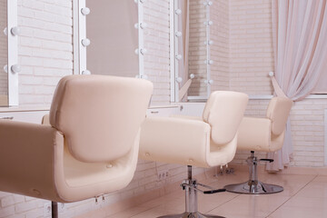 Working places for masters in hairdressing beauty salon. Modern design and interior.