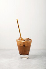 Frappuccino - Iced Coffee cocktail, refreshing summer drink. Light background, copy space