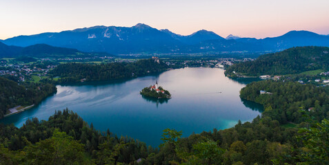 Lake Bled from above, view with the island of Lake Bled and the castle, Pilgrimage Church of the Assumption of Maria
