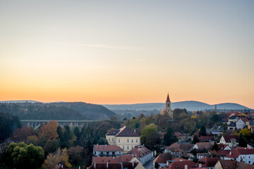 Obraz premium The Veszprém viaduct and the Church of Saint Laszlo at sunset