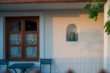  Sukoro's Wild bird hospital, Old style house with a ceramics owl