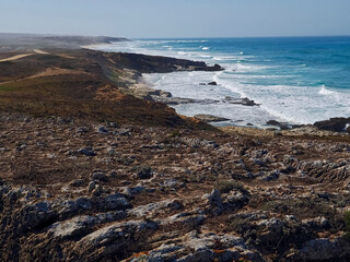 Beautiful Alentejo coast of Portugal in Porto Covo with wild dunes, rocks and the blue Atlantic ocean